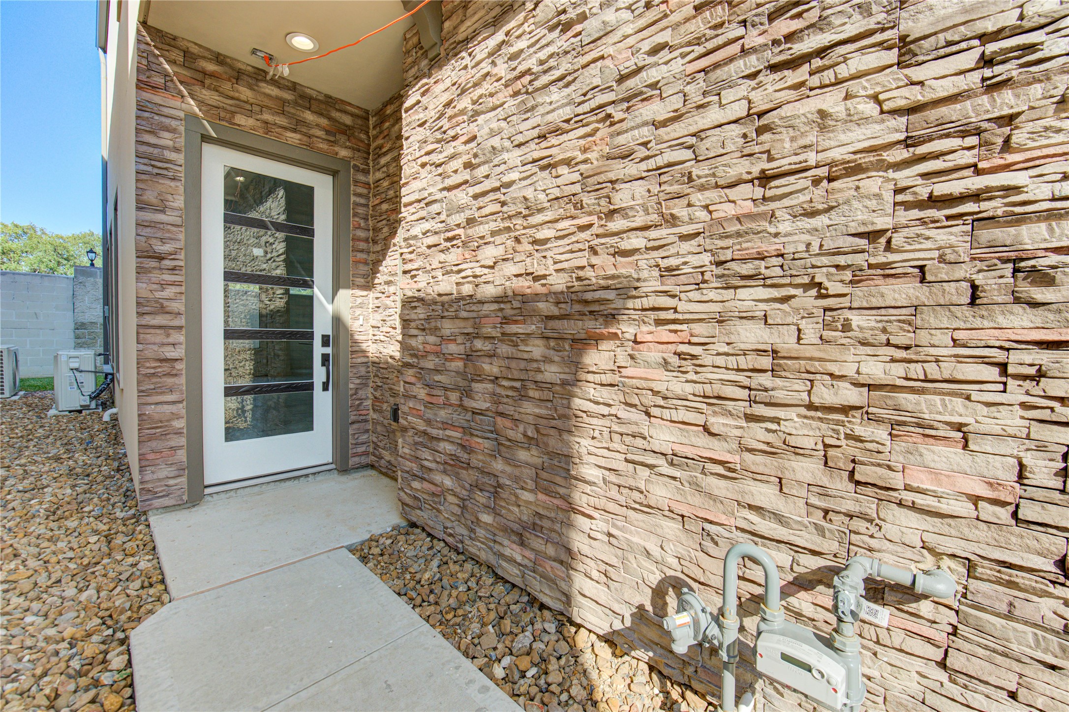 2920 El Fenice Lane Houston, TX 77057 - Photo 5 of 42 a view of a pathway door with wooden floor