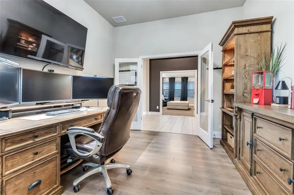 a view of a workspace with furniture