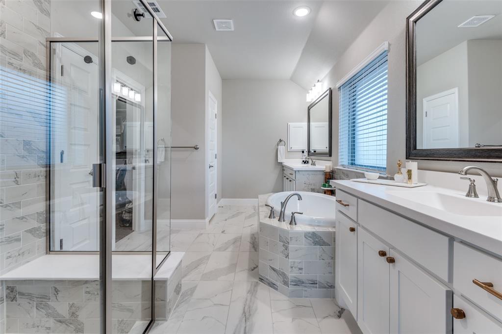 425 Acadia Lane Forney, TX 75126 - Photo 26 of 37 a bathroom with a double vanity sink mirror and shower