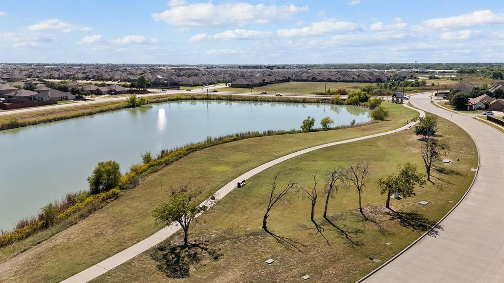 425 Acadia Lane Forney, TX 75126 - Photo 37 of 37 a view of a swimming pool with a lake
