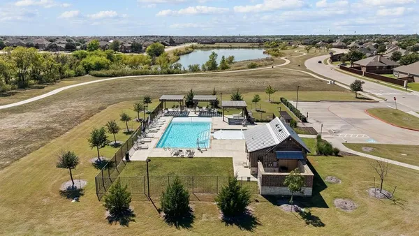 an aerial view of a house with a garden