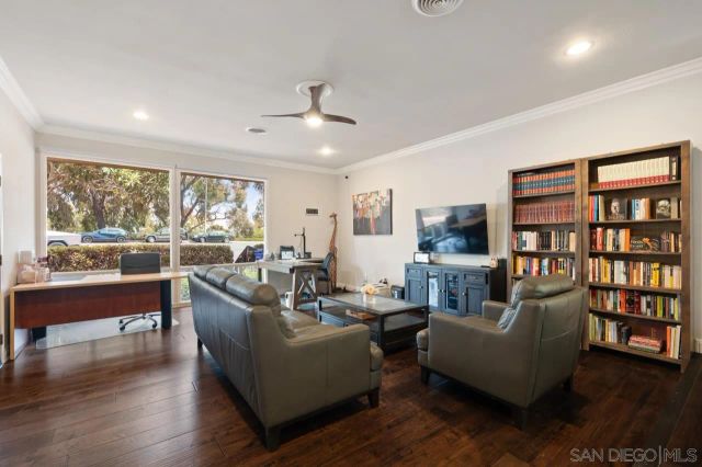 a spacious bathroom with a granite countertop sink and a mirror