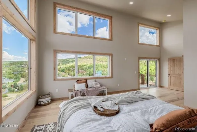 a view of a room with a bed