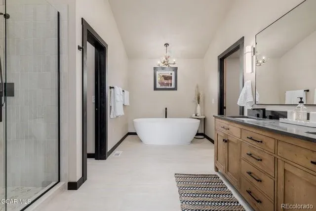 a white bath tub sitting in a bathroom