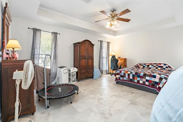 a bathroom with a bathtub and a sink
