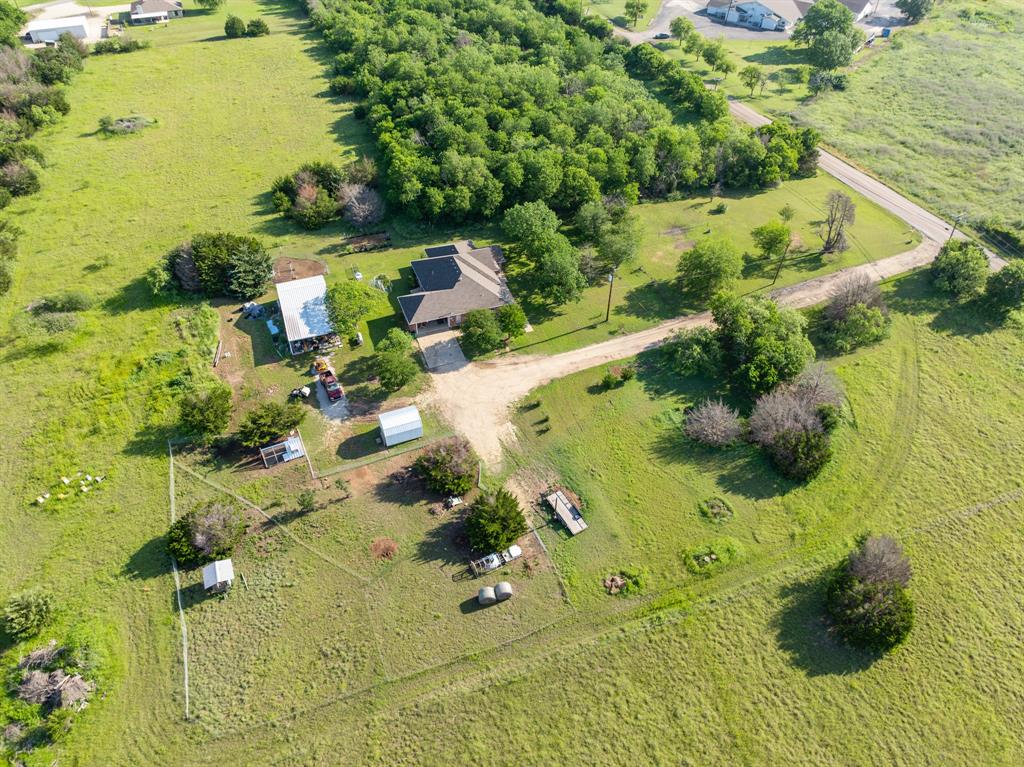 4037 Old Dallas Road Elm Mott, TX 76640 - Photo 34 of 40 a view of a garden with an ocean