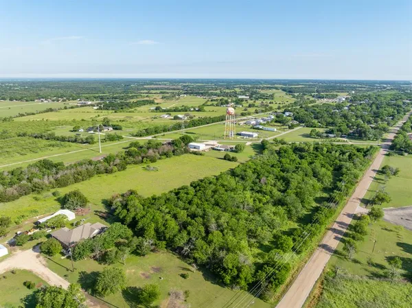 a view of an ocean and mountain