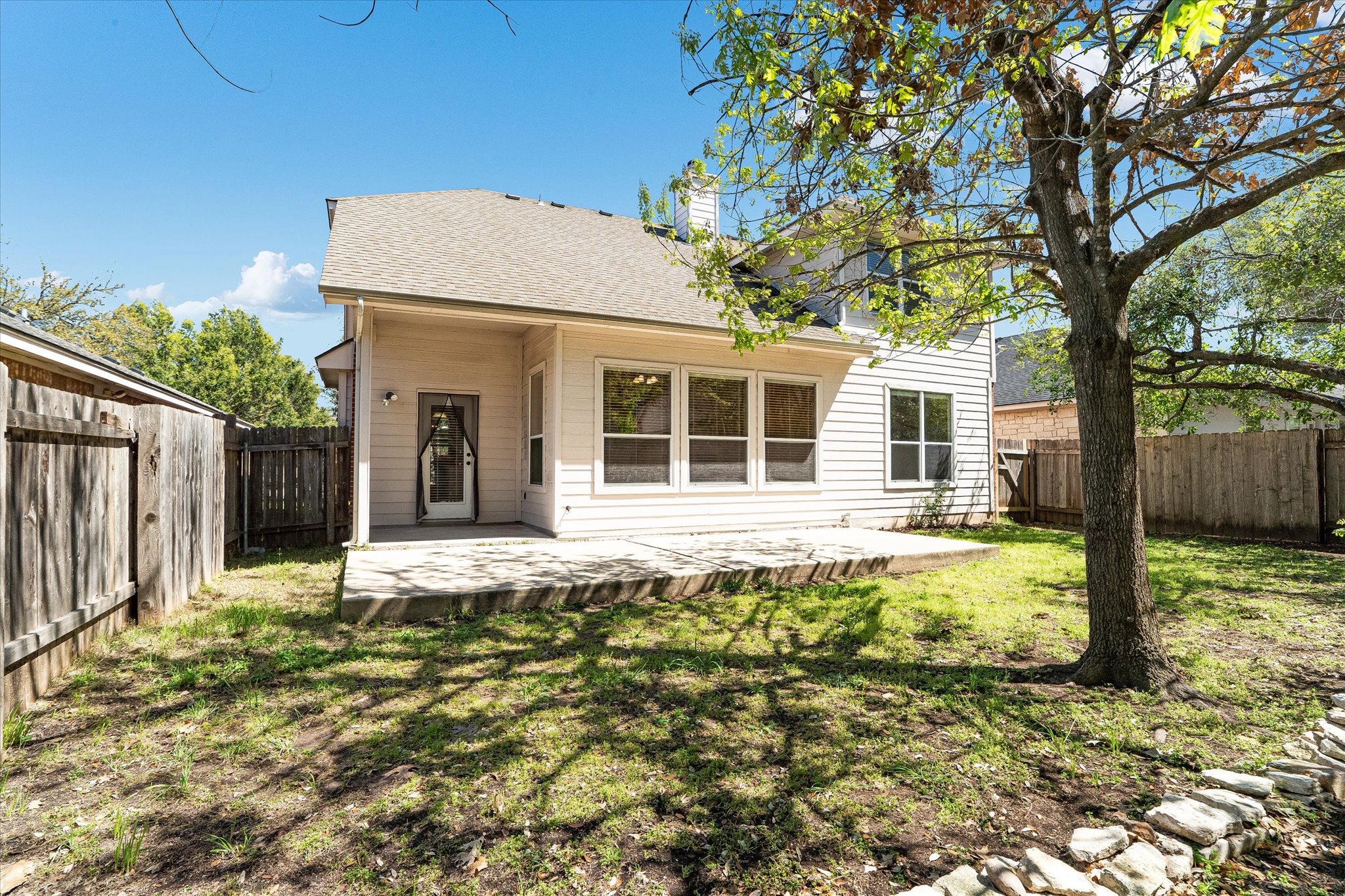 2207 Clover Ridge Drive Cedar Park, TX 78613 - Photo 23 of 25 Back yard with covered patio