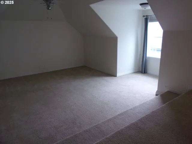 a bathroom with a granite countertop toilet a sink and a bathtub