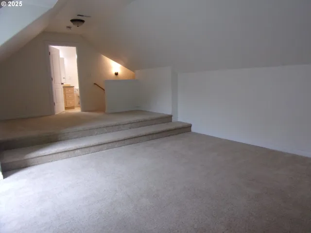 a view of a deck with wooden floor and fence