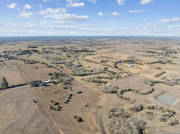 a view of a dry yard with mountain