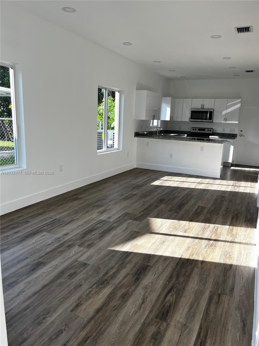 37 Northwest 70th Street, Unit B Miami, FL 33150 - Photo 2 of 17 Living Room and Dining Room