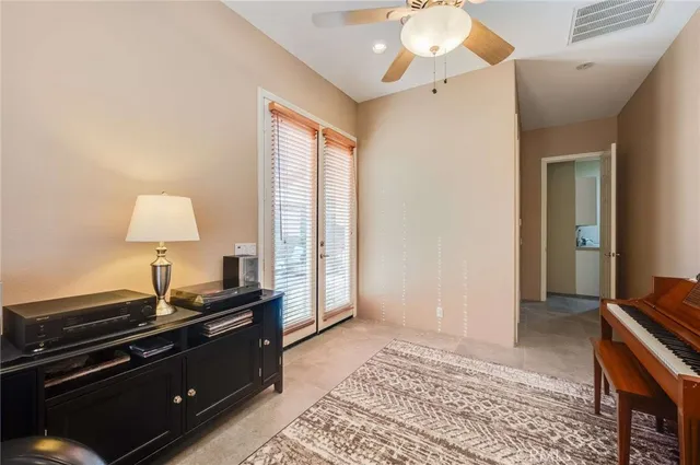 a bed room with a bed and a lamp