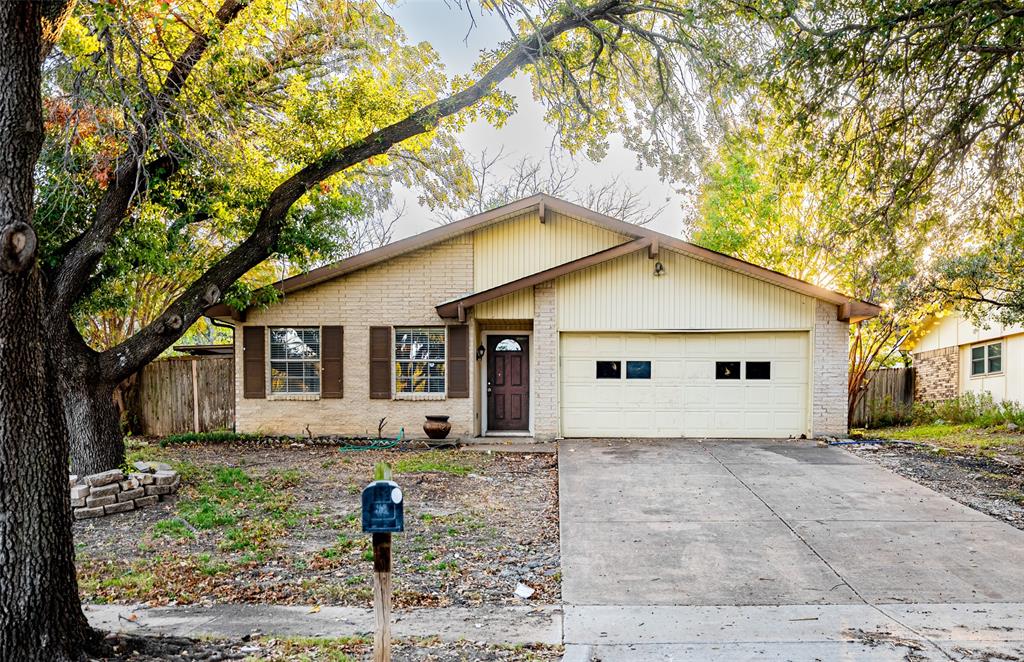 3401 Tarkio Road Plano, TX 75074 - Photo 1 of 11 a front view of house with yard and trees around