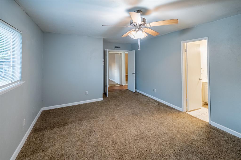 3401 Tarkio Road Plano, TX 75074 - Photo 11 of 11 an empty room with windows and fan