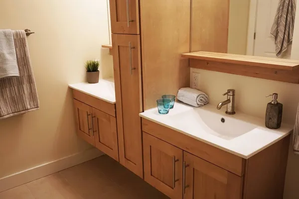 a bathroom with a sink and a mirror