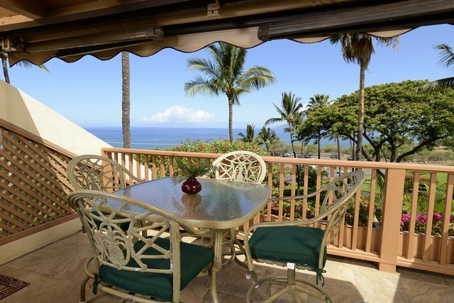 2777 South Kihei Road, Unit A207 Kihei, HI 96753 - Photo 1 of 30 a view of a dining room with furniture and chandelier