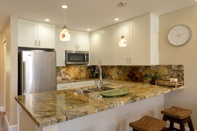 2777 South Kihei Road, Unit A207 Kihei, HI 96753 - Photo 11 of 30 a view of a kitchen with stainless steel appliances granite countertop a sink and a refrigerator