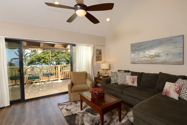 2777 South Kihei Road, Unit A207 Kihei, HI 96753 - Photo 13 of 30 a living room with furniture and a large window