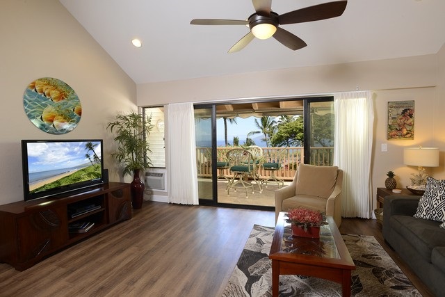 2777 South Kihei Road, Unit A207 Kihei, HI 96753 - Photo 16 of 30 a living room with furniture and a flat screen tv