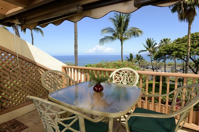 2777 South Kihei Road, Unit A207 Kihei, HI 96753 - Photo 22 of 30 a balcony with table and chairs