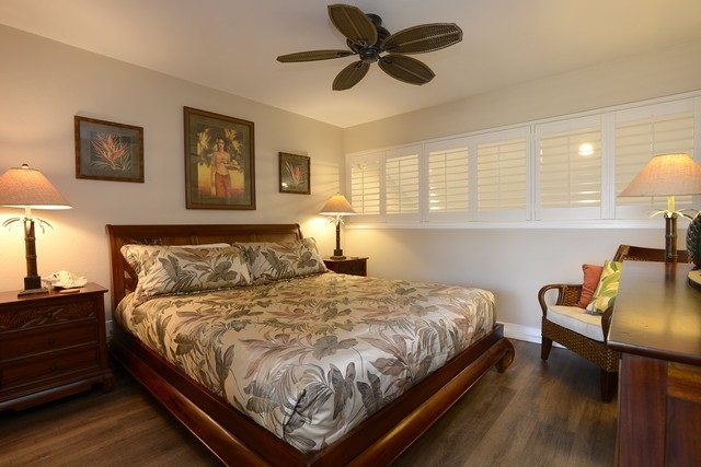 2777 South Kihei Road, Unit A207 Kihei, HI 96753 - Photo 5 of 30 a bedroom with a bed and a desk with chair