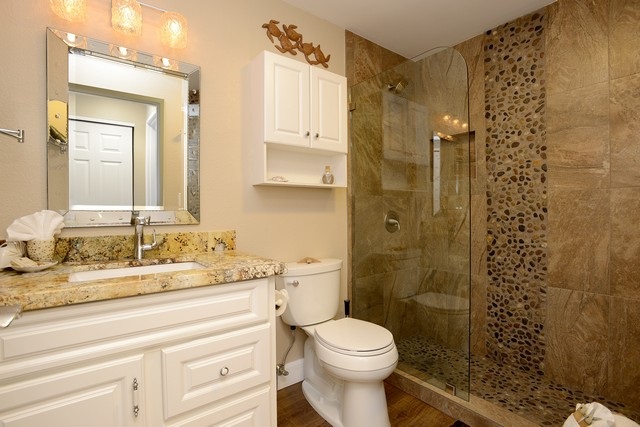 2777 South Kihei Road, Unit A207 Kihei, HI 96753 - Photo 7 of 30 a bathroom with a granite countertop sink toilet and shower