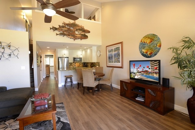 2777 South Kihei Road, Unit A207 Kihei, HI 96753 - Photo 8 of 30 a living room with furniture and a flat screen tv