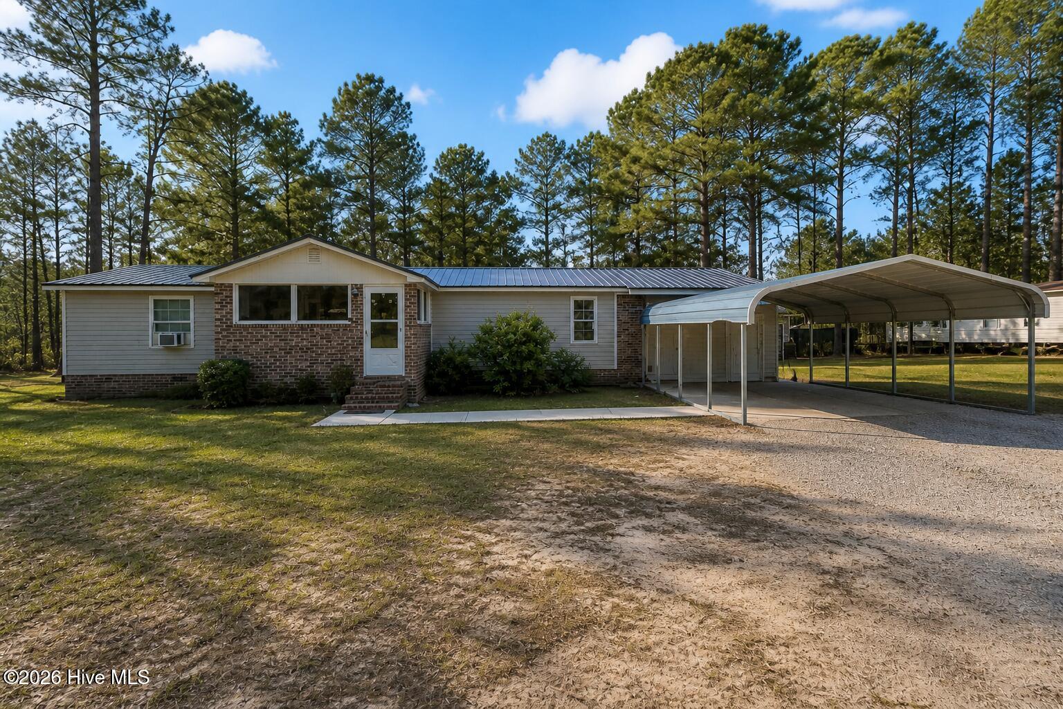 8801 Johns Mill Road Maxton, NC 28364 - Photo 1 of 14 8BC8EAF7-1BCE-4560-AA18-70B829A7A930