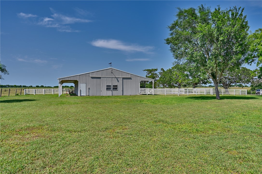 2120 Hohenwalde School Road Brenham, TX 77833 - Photo 21 of 30 a front view of a house with garden