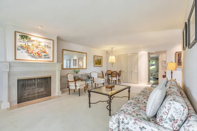 a large kitchen with a sink window and cabinets