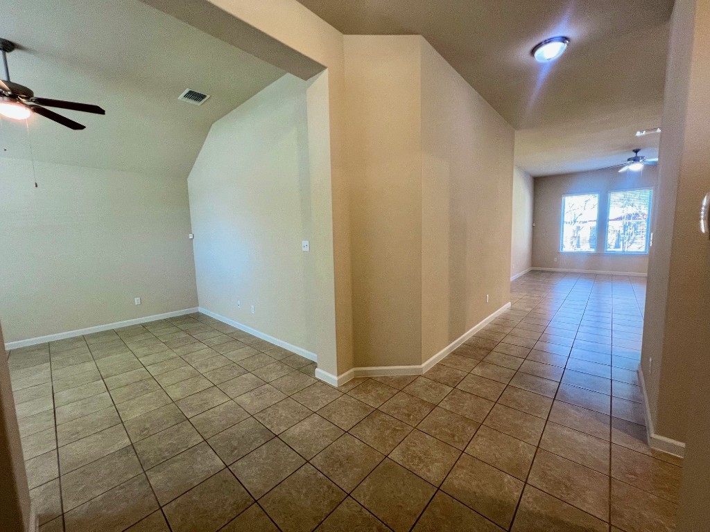 114 Clear Water Pass Bastrop, TX 78602 - Photo 11 of 37 Front entryway with flex room to the left and hallway leading to living room and kitchen