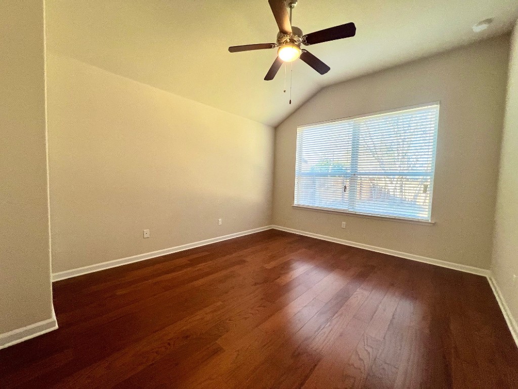 114 Clear Water Pass Bastrop, TX 78602 - Photo 18 of 37 Main bedroom with wood flooring