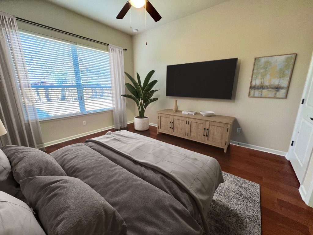 114 Clear Water Pass Bastrop, TX 78602 - Photo 6 of 37 VS-Main Bedroom with plenty of natural light and ceiling fan (no carpet)!