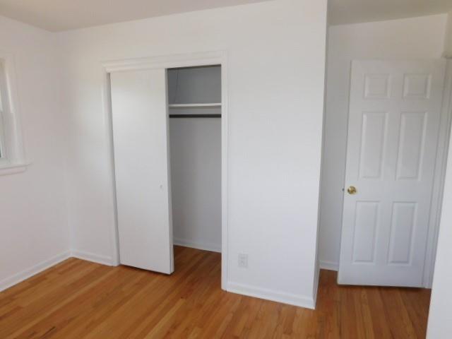 2407 Summerland Drive Decatur, GA 30032 - Photo 18 of 22 a view of empty room with wooden floor