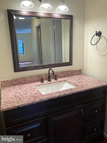 a bathroom with a shower and a toilet