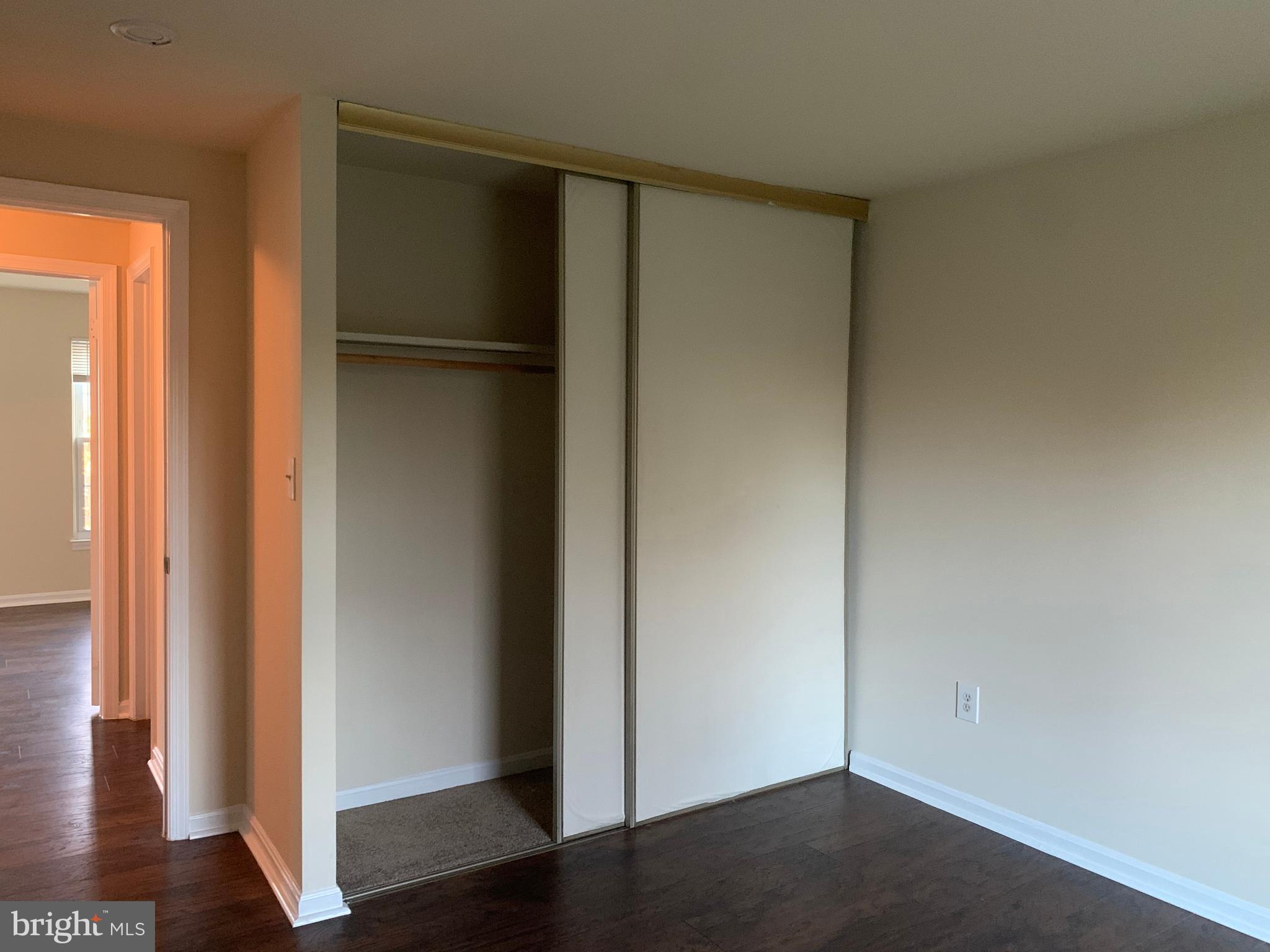 1658 Colonial Way Frederick, MD 21702 - Photo 17 of 32 a view of empty room with wooden floor