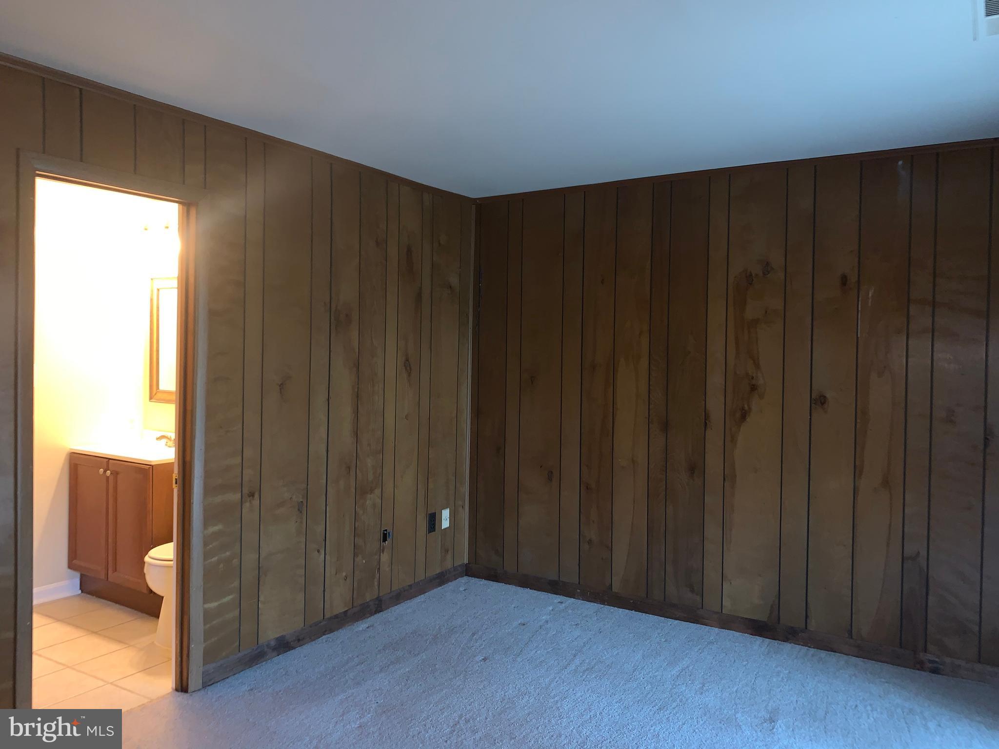 1658 Colonial Way Frederick, MD 21702 - Photo 18 of 32 a view of an empty room and wooden floor