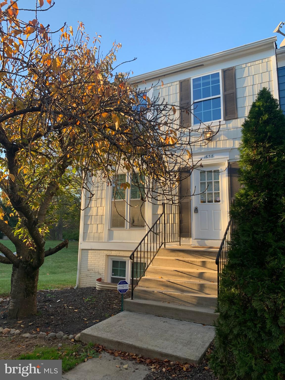 1658 Colonial Way Frederick, MD 21702 - Photo 31 of 32 a front view of a house with a yard