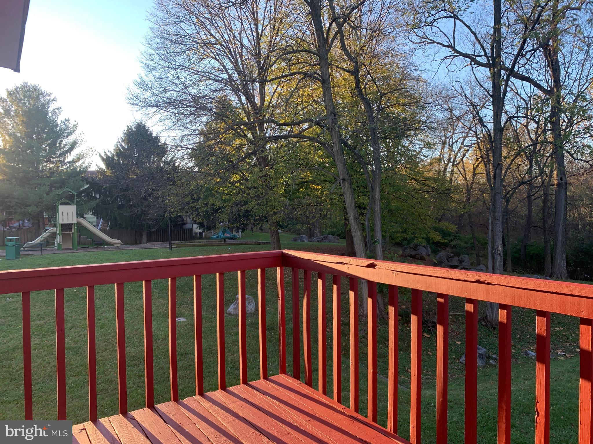 1658 Colonial Way Frederick, MD 21702 - Photo 8 of 32 a view of wooden deck and a yard