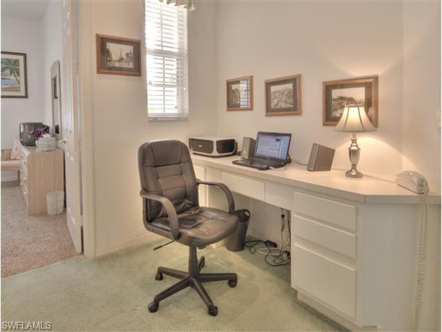 400 Harvard Court Naples, FL 34104 - Photo 12 of 16 a view of a workspace with furniture