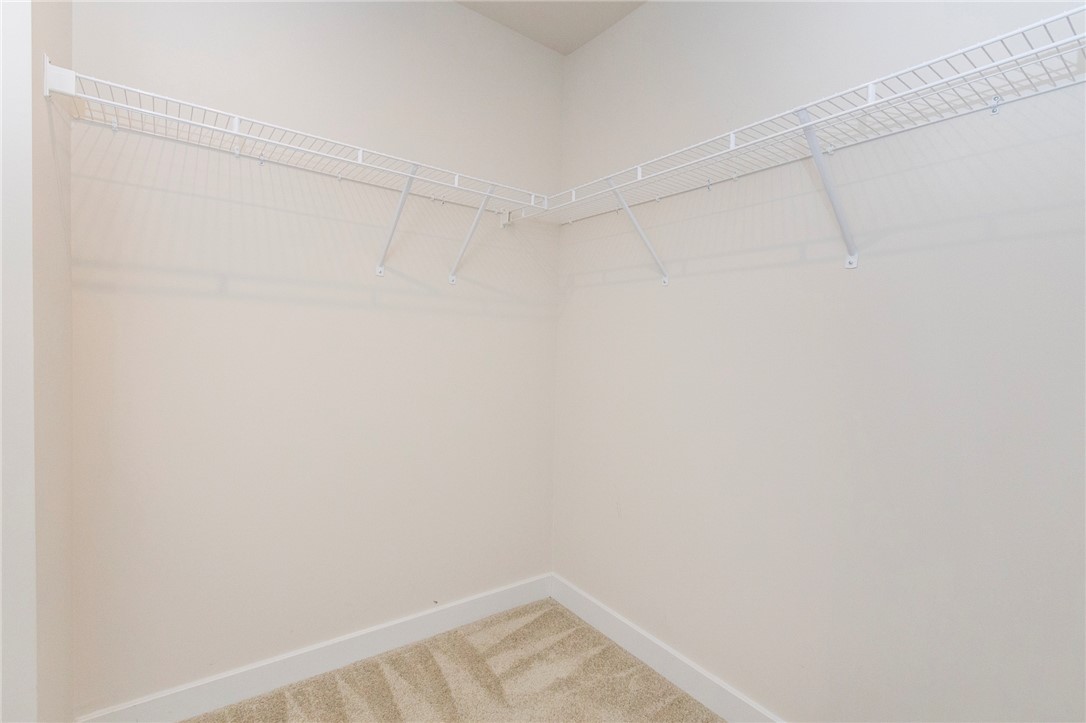 233 Scenic Road Anderson, SC 29621 - Photo 35 of 50 Functional wire shelving and soft carpeting define this convenient walk-in storage area.