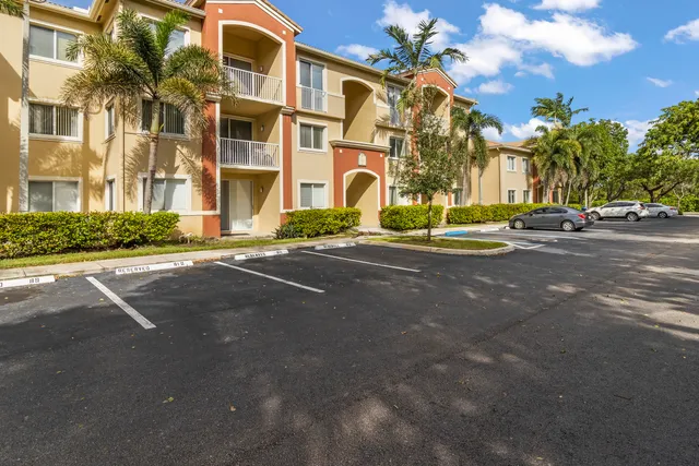 a view of a building with a street