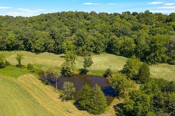 4500 Harpeth School Road Franklin, TN 37064 - Photo 2 of 8 a view of a lake with a mountain