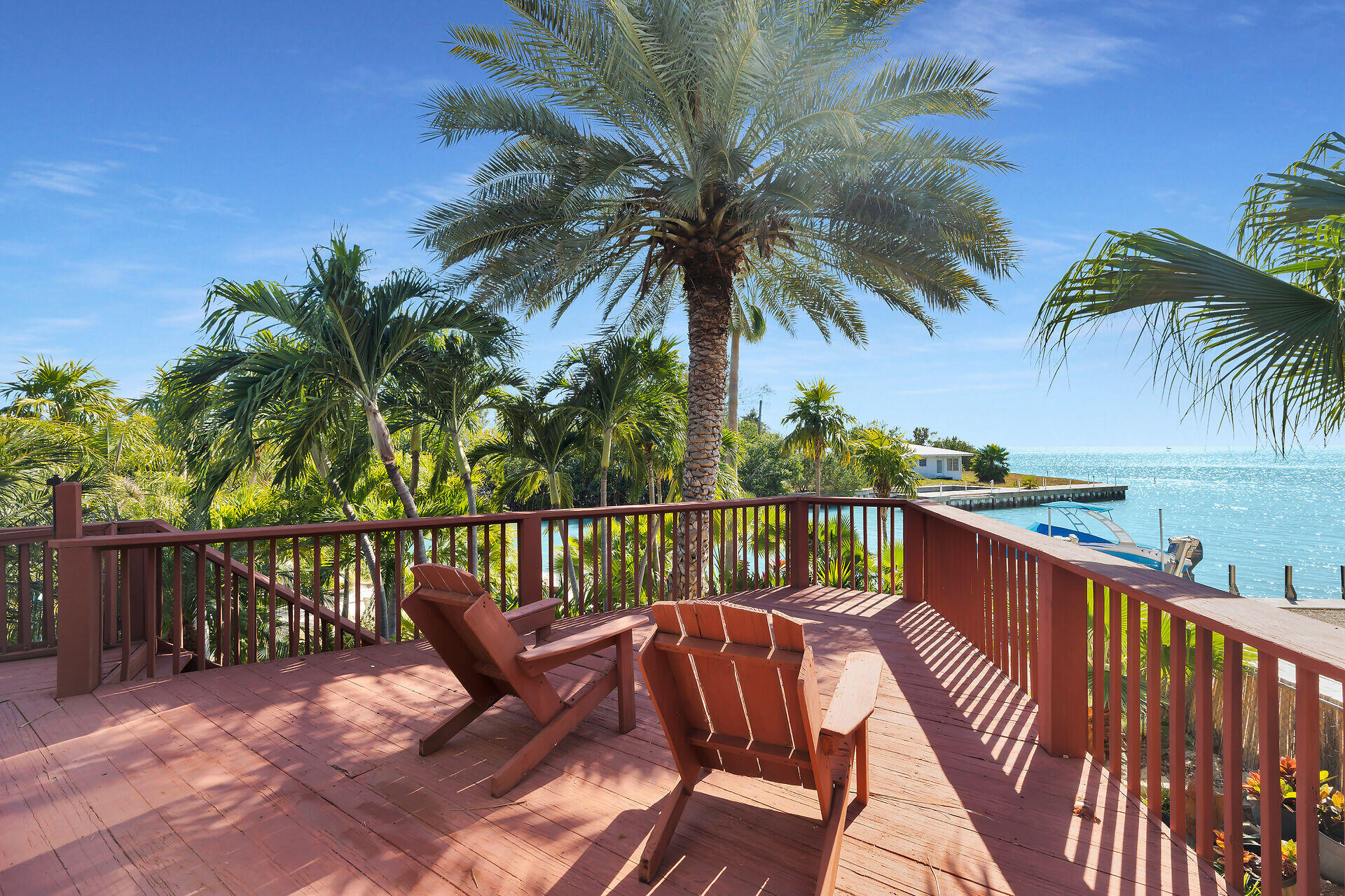 42 Treasure Road Marathon, FL 33050 - Photo 53 of 70 a view of a roof deck with wooden floor and fence