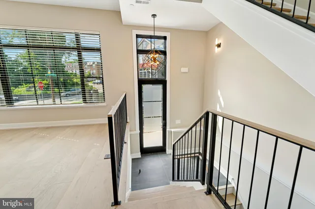 a view of a hallway with windows