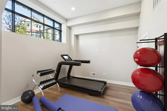 a room with furniture and wooden floor