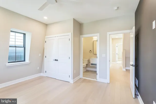 a view of a bathroom with a glass door shower