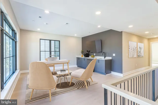 a workspace with furniture and window