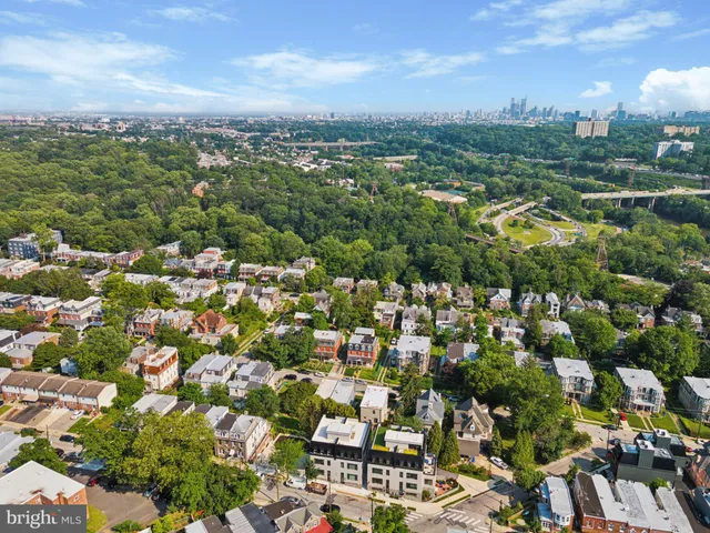 a front view of residential houses with street
